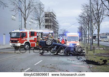 "Ambulance and a fire engine at the scene of an accident, BMW sports car on its roof, overturned car, Germany, Europe" View Large Photo Image Stock Image - "Ambulance and a fire engine at the scene of an accident, BMW sports car on its roof, overturned car, Germany, Europe". Fotosearch