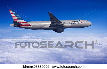 American Airlines Boeing 777-223 ER in flight View Large Photo Image Stock Image - American Airlines Boeing 777-223 ER in flight. Fotosearch