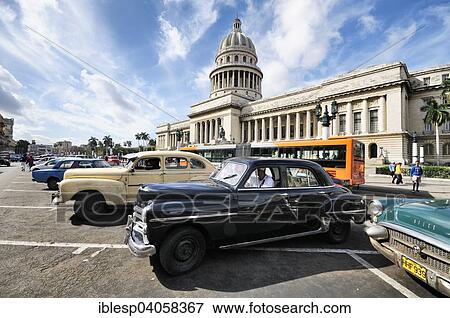 "American classic car from the 50s, in front of the Capitol, El Capitolio, Prado, Paseo de Marti, Centro Habana, Havana, Ciudad de La Habana, Cuba, North America" View Large Photo Image Stock Photo - "American classic car from the 50s, in front of the Capitol, El Capitolio, Prado, Paseo de Marti, Centro Habana, Havana, Ciudad de La Habana, Cuba, North America". Fotosearch