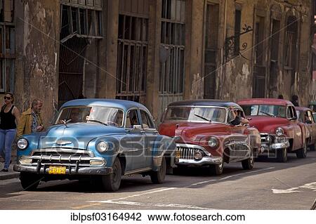 "American classic cars from the '50s and colourful facades, Centro Habana, Havana, Cuba, North America" View Large Photo Image Stock Image - "American classic cars from the '50s and colourful facades, Centro Habana, Havana, Cuba, North America". Fotosearch