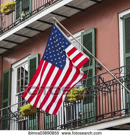"American flag outside a historic house in the French Quarter, New Orleans, Louisiana, United States, North America" View Large Photo Image Stock Photography - "American flag outside a historic house in the French Quarter, New Orleans, Louisiana, United States, North America". Fotosearch