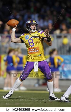 "American football, QB Christoph Gross, No. 8 Vikings, passes the ball, Graz Giants vs. Vienna Vikings, Vienna, Vienna State, Austria, Europe" View Large Photo Image Stock Photo - "American football, QB Christoph Gross, No. 8 Vikings, passes the ball, Graz Giants vs. Vienna Vikings, Vienna, Vienna State, Austria, Europe". Fotosearch