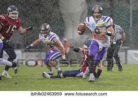 "American football, QB Christoph Gross, No. 8 Vikings, runs with the ball, Vienna Vikings vs. Calanda Broncos, final game of the European Football League 2012, Vaduz, Liechtenstein, Europe" View Large Photo Image Stock Photo - "American football, QB Christoph Gross, No. 8 Vikings, runs with the ball, Vienna Vikings vs. Calanda Broncos, final game of the European Football League 2012, Vaduz, Liechtenstein, Europe". Fotosearch