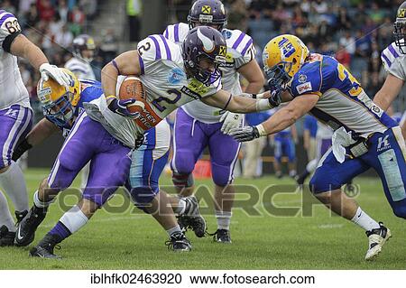 "American football, RB Dusty Thornhill, No. 2 Vikings, is tackled by LB Alex Gross, No. 37 Giants, Vienna Vikings vs. Graz Giants, Vienna, Vienna State, Austria, Europe" View Large Photo Image Stock Image - "American football, RB Dusty Thornhill, No. 2 Vikings, is tackled by LB Alex Gross, No. 37 Giants, Vienna Vikings vs. Graz Giants, Vienna, Vienna State, Austria, Europe". Fotosearch