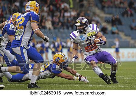 "American football, RB Dusty Thornhill, No. 2 Vikings, runs with the ball, Vienna Vikings vs. Graz Giants, Graz, Austria, Europe" View Large Photo Image Stock Photograph - "American football, RB Dusty Thornhill, No. 2 Vikings, runs with the ball, Vienna Vikings vs. Graz Giants, Graz, Austria, Europe". Fotosearch