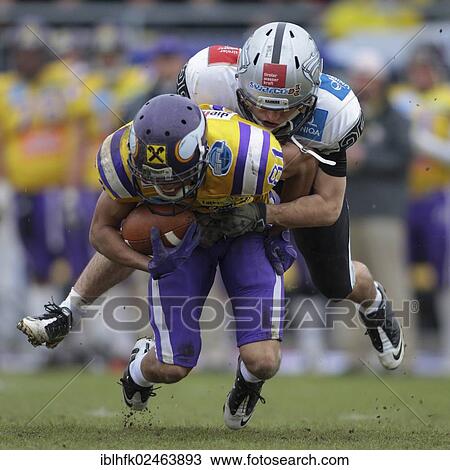 "American football, WR Laurinho Walch, No. 81 Vikings, is tackled DB Andreas Bertsch, No. 25 Raiders, Swarco Raiders Tirol vs. Vienna Vikings, Vienna, Vienna State, Austria, Europe" View Large Photo Image Stock Image - "American football, WR Laurinho Walch, No. 81 Vikings, is tackled DB Andreas Bertsch, No. 25 Raiders, Swarco Raiders Tirol vs. Vienna Vikings, Vienna, Vienna State, Austria, Europe". Fotosearch