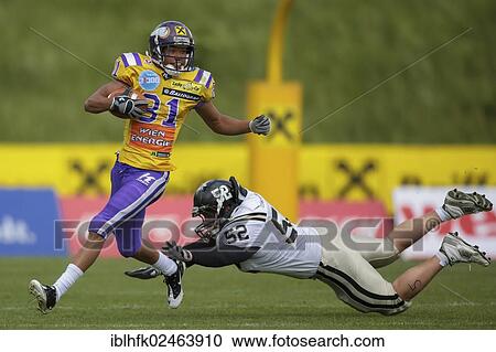 Stock Image - "American football, WR Laurinho Walch, No. 81 Vikings, is tackled LB Tomas Svoboda, No. 52 Panthers, Vienna Vikings vs. Prague Panthers, Vienna, Vienna State, Austria, Europe". Fotosearch