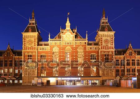 Stock Image - "Amsterdam Centraal railway station, Amsterdam, province of North Holland, The Netherlands, Europe". Fotosearch