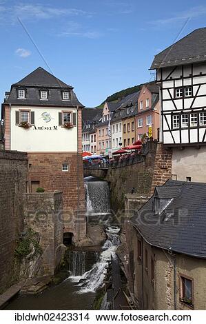Picture - Amueseum museum and waterfall in the Old Town, Saarburg, Saarland, Rhineland-Palatinate, Germany, Europe, PublicGround, Europe. Fotosearch