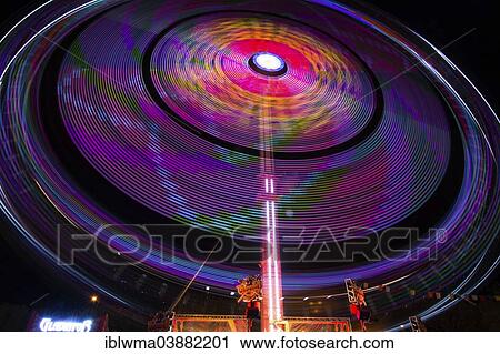 "Amusement ride, light trails at night, Kassel, Hesse, Germany, Europe" View Large Photo Image Stock Image - "Amusement ride, light trails at night, Kassel, Hesse, Germany, Europe". Fotosearch