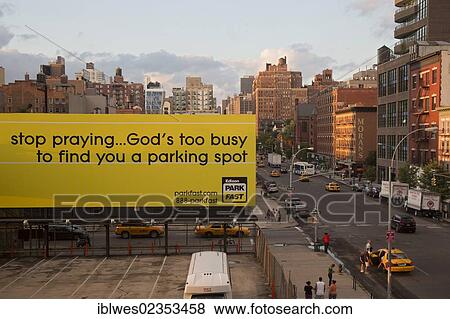 Stock Photo - "An advertisement for the parking company Park Fast on 10th Avenue in Manhattan, New York, New York, USA". Fotosearch