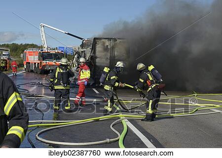 "An airport fire engine is helping to extinguish at a truck fire on the A8 motorway near the """"Echterdinger Ei"""" junction, Stuttgart, Baden-Wuerttemberg, Germany, Europe" View Large Photo Image Stock Image - "An airport fire engine is helping to extinguish at a truck fire on the A8 motorway near the """"Echterdinger Ei"""" junction, Stuttgart, Baden-Wuerttemberg, Germany, Europe". Fotosearch