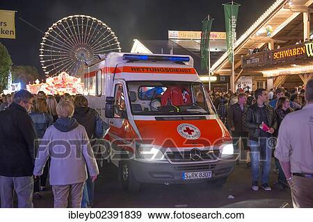"An ambulance standing in the crowd, Cannstatter Wasen fairground, funfair, Bad Cannstatt, Stuttgart, Baden-Wuerttemberg, Germany, Europe" View Large Photo Image Stock Photo - "An ambulance standing in the crowd, Cannstatter Wasen fairground, funfair, Bad Cannstatt, Stuttgart, Baden-Wuerttemberg, Germany, Europe". Fotosearch