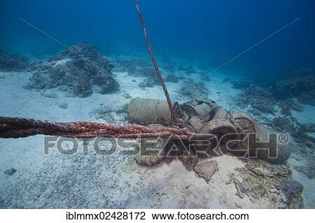 "An anchor made of concrete blocks and old barrels in the coral reef, Philippines, Asia" View Large Photo Image Stock Image - "An anchor made of concrete blocks and old barrels in the coral reef, Philippines, Asia". Fotosearch