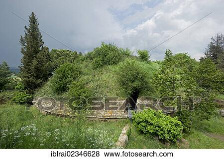 "An antique round tumulus grave, Tomba della Capanna, 7th century BC, Etruscan Necropolis of La Banditaccia, Necropoli della Banditaccia, Cerveteri, province of Rome, Lazio region, Italy, Europe" View Large Photo Image Stock Photo - "An antique round tumulus grave, Tomba della Capanna, 7th century BC, Etruscan Necropolis of La Banditaccia, Necropoli della Banditaccia, Cerveteri, province of Rome, Lazio region, Italy, Europe". Fotosearch