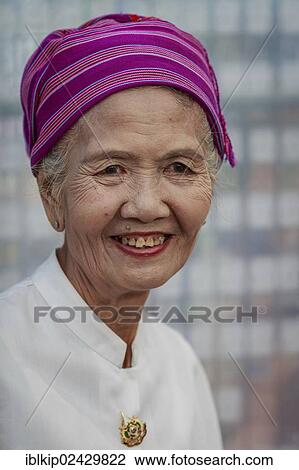 Stock Image - "An elderly woman from Chiang Mai, portrait, Northern Thailand, Asia". Fotosearch