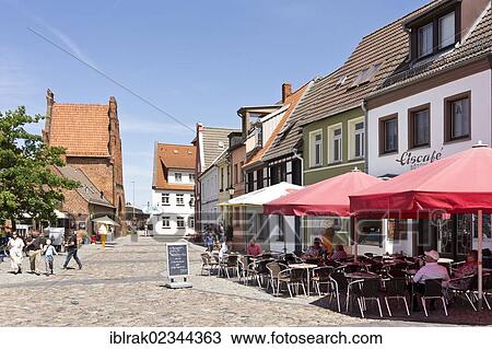 "An ice cream parlour and commercial buildings next to the Wassertor gate near the old port, Wismar, Mecklenburg-Western Pomerania, Germany, Europe" View Large Photo Image Stock Image - "An ice cream parlour and commercial buildings next to the Wassertor gate near the old port, Wismar, Mecklenburg-Western Pomerania, Germany, Europe". Fotosearch