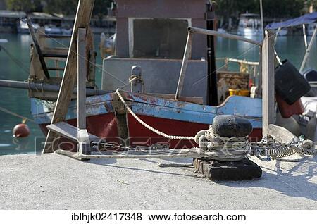 An old fishing boat in the harbor, Vassiliki, Lefkas, Greece, Europe View Large Photo Image Stock Photo - An old fishing boat in the harbor, Vassiliki, Lefkas, Greece, Europe. Fotosearch