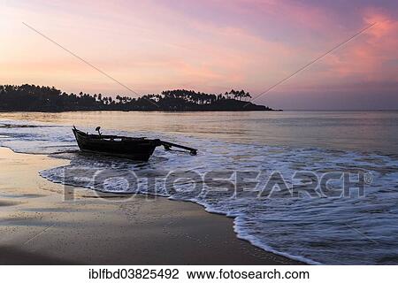 "An old fishing boat on Palolem Beach, Canacona, Goa, India, Asia" View Large Photo Image Stock Image - "An old fishing boat on Palolem Beach, Canacona, Goa, India, Asia". Fotosearch
