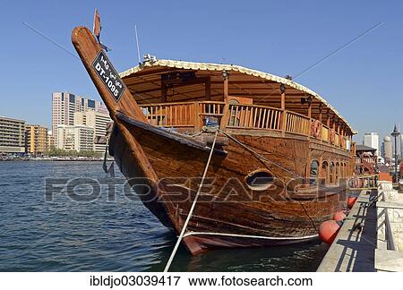 "An old wooden dhow on Dubai Creek, Emirate of Dubai, United Arab Emirates, Asia" View Large Photo Image Stock Photo - "An old wooden dhow on Dubai Creek, Emirate of Dubai, United Arab Emirates, Asia". Fotosearch