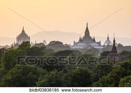 "Ananda Temple, gilded tower structure or Shikhara, Thatbyinnyu Temple, stupas, pagodas, temple complex, in the evening light, Plateau of Bagan, Mandalay Division, Burma or Myanmar" View Large Photo Image Stock Photography - "Ananda Temple, gilded tower structure or Shikhara, Thatbyinnyu Temple, stupas, pagodas, temple complex, in the evening light, Plateau of Bagan, Mandalay Division, Burma or Myanmar". Fotosearch