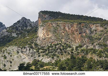 "Ancient city of Pinara, necropolis, rock tombs, Xanthos Valley, Pinara, Mugla Province, Aegean region, Turkey, Asia" View Large Photo Image Stock Photography - "Ancient city of Pinara, necropolis, rock tombs, Xanthos Valley, Pinara, Mugla Province, Aegean region, Turkey, Asia". Fotosearch