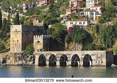 "Ancient Seljuk shipyard, Tershane, Alanya, Turkish Riviera, Province of Antalya, Mediterranean Region, Turkey, Asia" View Large Photo Image Stock Photo - "Ancient Seljuk shipyard, Tershane, Alanya, Turkish Riviera, Province of Antalya, Mediterranean Region, Turkey, Asia". Fotosearch