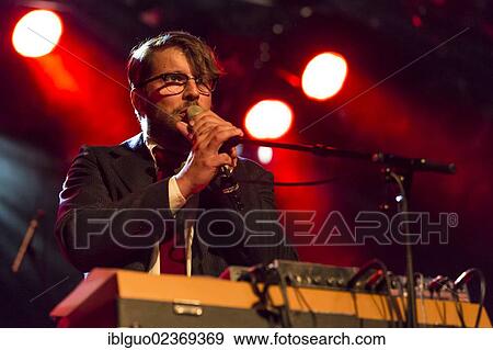 "Andi Peter, singer of the Swiss band Kabel singing live at the Schueuer, Luzern, Switzerland, Europe" View Large Photo Image Stock Photo - "Andi Peter, singer of the Swiss band Kabel singing live at the Schueuer, Luzern, Switzerland, Europe". Fotosearch