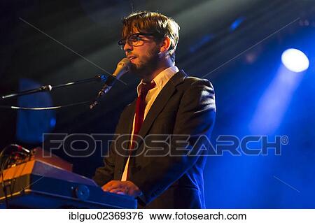 "Andi Peter, singer of the Swiss band Kabel singing live at the Schueuer, Luzern, Switzerland, Europe" View Large Photo Image Stock Photograph - "Andi Peter, singer of the Swiss band Kabel singing live at the Schueuer, Luzern, Switzerland, Europe". Fotosearch