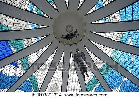 "Angel hanging from the ceiling of the Cathedral of Brasilia, Catedral Metropolitana Nossa Senhora Aparecida at night, by architect Oscar Niemeyer, Brasilia, Federal District, Distrito Federal do Brasil, Brazil, South America" View Large Photo Image Picture - "Angel hanging from the ceiling of the Cathedral of Brasilia, Catedral Metropolitana Nossa Senhora Aparecida at night, by architect Oscar Niemeyer, Brasilia, Federal District, Distrito Federal do Brasil, Brazil, South America". Fotosearch