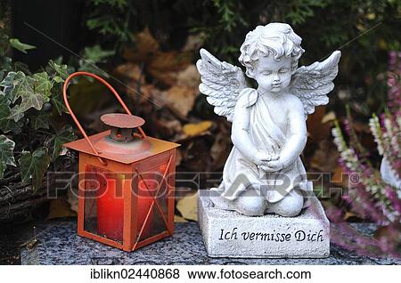 "Angel sculpture and a grave lantern, Ohlsdorf Cemetery, Hamburg, Germany, Europe, PublicGround, Europe" View Large Photo Image Stock Photo - "Angel sculpture and a grave lantern, Ohlsdorf Cemetery, Hamburg, Germany, Europe, PublicGround, Europe". Fotosearch