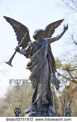 "Angel statue with trumpet, Westfriedhof, Munich, Upper Bavaria, Bavaria, Germany, Europe" View Large Photo Image Stock Image - "Angel statue with trumpet, Westfriedhof, Munich, Upper Bavaria, Bavaria, Germany, Europe". Fotosearch