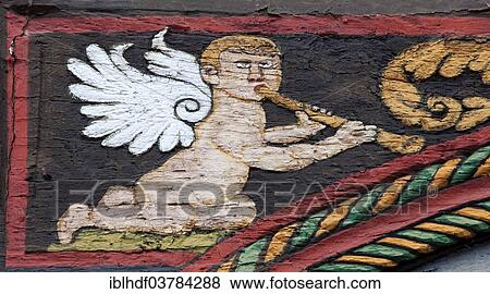 "Angel with a flute on a half-timbered house, Einbeck, Lower Saxony, Germany, Europe" View Large Photo Image Stock Photo - "Angel with a flute on a half-timbered house, Einbeck, Lower Saxony, Germany, Europe". Fotosearch
