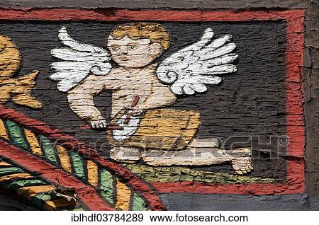 "Angel with drums on a half-timbered house, Einbeck, Lower Saxony, Germany, Europe" View Large Photo Image Stock Photo - "Angel with drums on a half-timbered house, Einbeck, Lower Saxony, Germany, Europe". Fotosearch