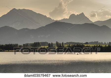 Stock Photo - "Angler in boat on the Alpsee lake, Schwangau, Ostallgau, Allgau, Schwabia, Bavaria, Germany, Europe". Fotosearch