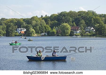 "Anglers in a boat on Ziegelsee Lake, Moelln, Schleswig-Holstein, Germany, Europe" View Large Photo Image Picture - "Anglers in a boat on Ziegelsee Lake, Moelln, Schleswig-Holstein, Germany, Europe". Fotosearch