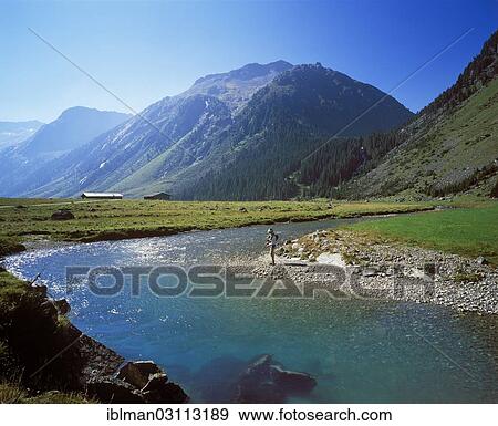 "Anglers on the Krimmler Ache River, Unlassalm, Krimmler Achental, Pinzgau, Nationalpark Hohe Tauern, Salzburg State, Austria, Europe" View Large Photo Image Stock Photo - "Anglers on the Krimmler Ache River, Unlassalm, Krimmler Achental, Pinzgau, Nationalpark Hohe Tauern, Salzburg State, Austria, Europe". Fotosearch