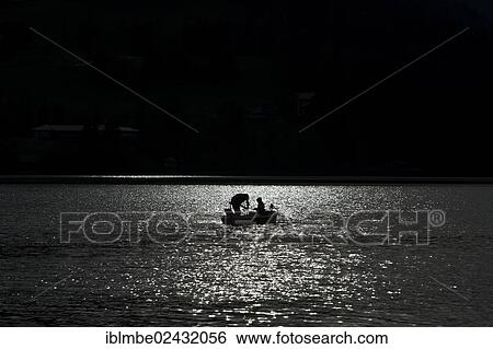 "Anglers with backlighting on Weissensee lake, Carinthia, Austria, Europe" View Large Photo Image Stock Photograph - "Anglers with backlighting on Weissensee lake, Carinthia, Austria, Europe". Fotosearch