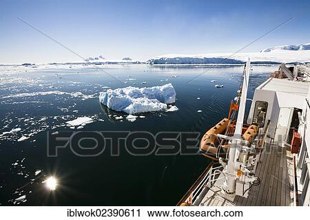 Stock Image - "Antarctica cruise, cruise ship off the Antarctic Peninsula, Antarctica". Fotosearch