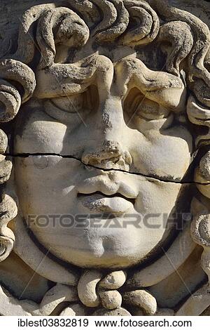 Stock Photo - "Antique Medusa or Gorgon head at the Apollon temple, archaeological site of Didyma, Ionia, Aydin Province, Turkey, Asia". Fotosearch
