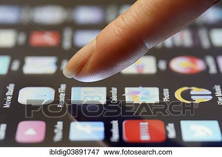 "App being selected by a finger on a touchscreen, close up" View Large Photo Image Stock Photo - "App being selected by a finger on a touchscreen, close up". Fotosearch