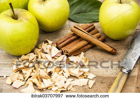 "Apple tea, apples and cinnamon sticks, Germany, Europe" View Large Photo Image Stock Photo - "Apple tea, apples and cinnamon sticks, Germany, Europe". Fotosearch