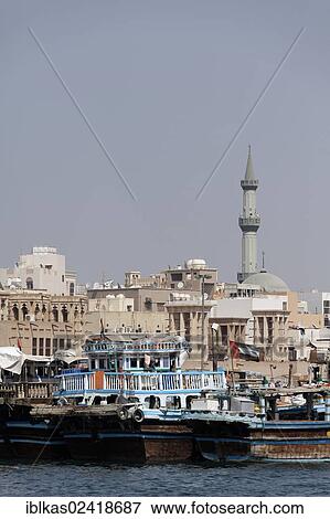 Arab dhows or daus on Dubai Creek, Deira district, Dubai, United Arab Emirates, Middle East, Asia View Large Photo Image Stock Photo - Arab dhows or daus on Dubai Creek, Deira district, Dubai, United Arab Emirates, Middle East, Asia. Fotosearch