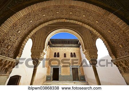 Stock Photo - "Arabesque Moorish architecture of an inner courtyard of the Palacios Nazaries, Alhambra Palace, Granada, Andalusia, Spain, Europe". Fotosearch