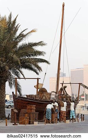 Arabs loading a wooden transport vessel, dau or dhow, representation with figures, Shindagha district, Dubai, United Arab Emirates, Middle East, Asia View Large Photo Image Stock Photography - Arabs loading a wooden transport vessel, dau or dhow, representation with figures, Shindagha district, Dubai, United Arab Emirates, Middle East, Asia. Fotosearch