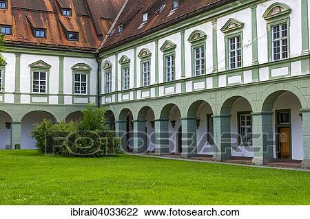 Stock Image - "Arcade, catholic monastery college, cloister, Benedictine monastery Benediktbeuern, Benediktbeuern, Upper Bavaria, Bavaria, Germany, Europe". Fotosearch