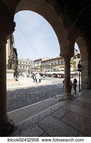 "Arcades of the Casa dei Mercanti building, Piazza delle Erbe square at the back, Verona, Veneto, Italy, Europe" View Large Photo Image Stock Photograph - "Arcades of the Casa dei Mercanti building, Piazza delle Erbe square at the back, Verona, Veneto, Italy, Europe". Fotosearch