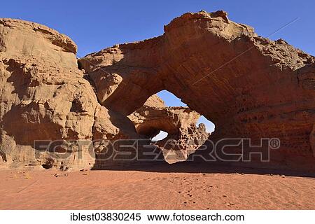 "Arch of Bouhadian, Tadrart region, Tassili n'Ajjer National Park, Unesco World Heritage Site, Algeria, Sahara, Africa" View Large Photo Image Stock Photography - "Arch of Bouhadian, Tadrart region, Tassili n'Ajjer National Park, Unesco World Heritage Site, Algeria, Sahara, Africa". Fotosearch