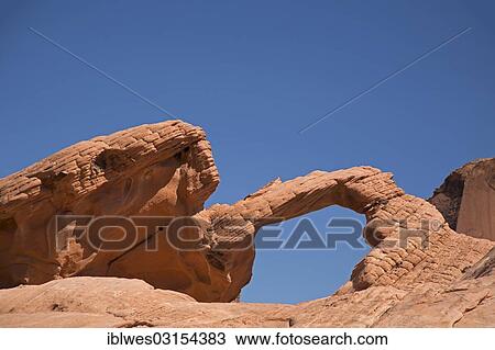 Stock Image - "Arch Rock, red sandstone formation, Valley of Fire State Park, Overton, Nevada, United States, North America". Fotosearch