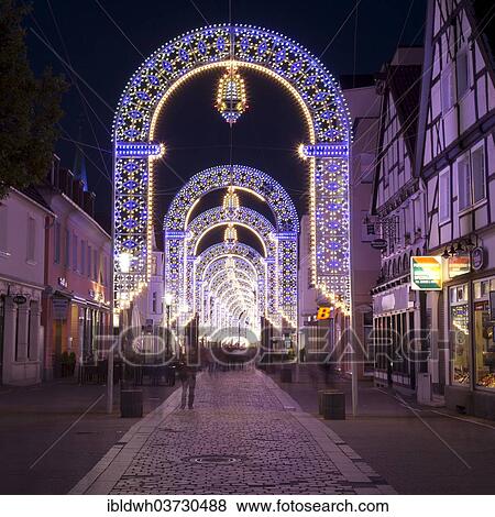 Stock Photo - "Arches with lights in the pedestrian zone, Italian festival """"Festa Italiana"""", Unna, Ruhr district, North Rhine-Westphalia, Germany, Europe". Fotosearch